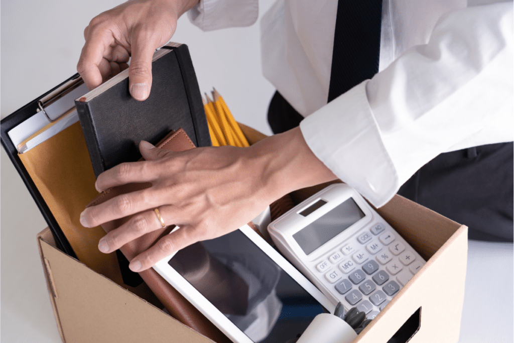 Fired Employee Packing Personal Things in a Box