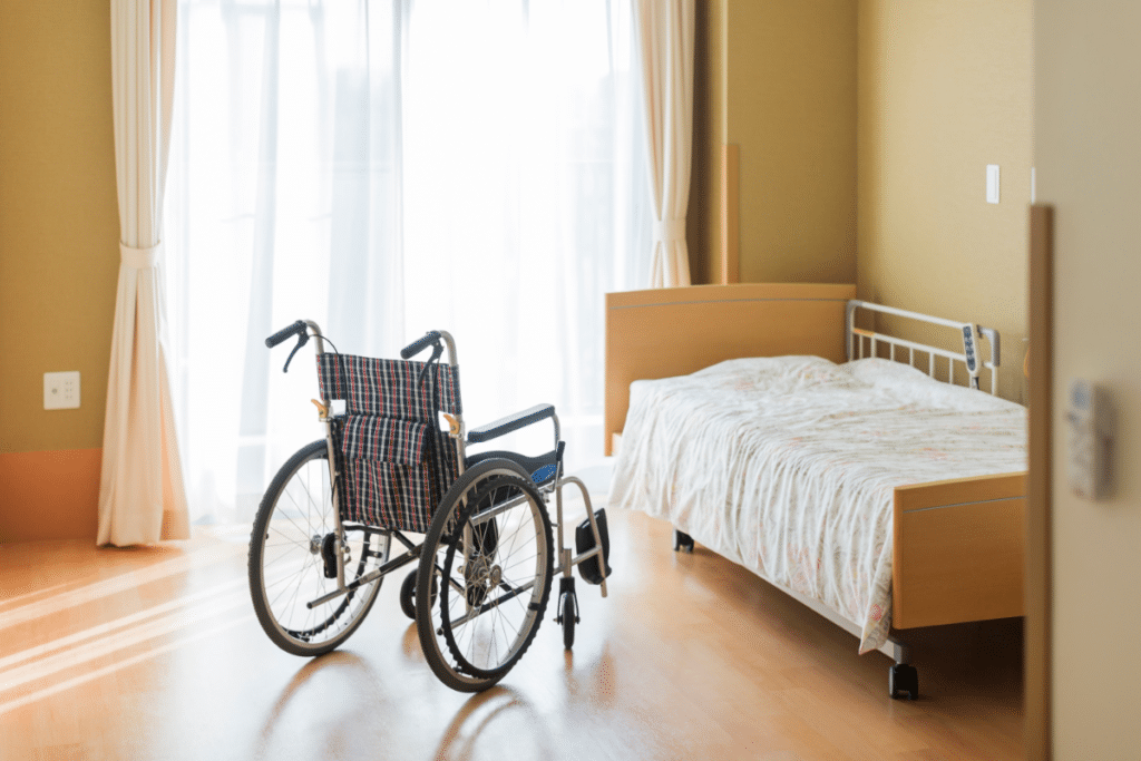 Nursing home room with bed and window