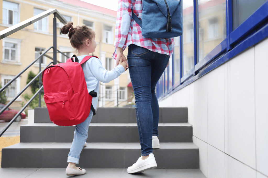 Child leaving school with mother