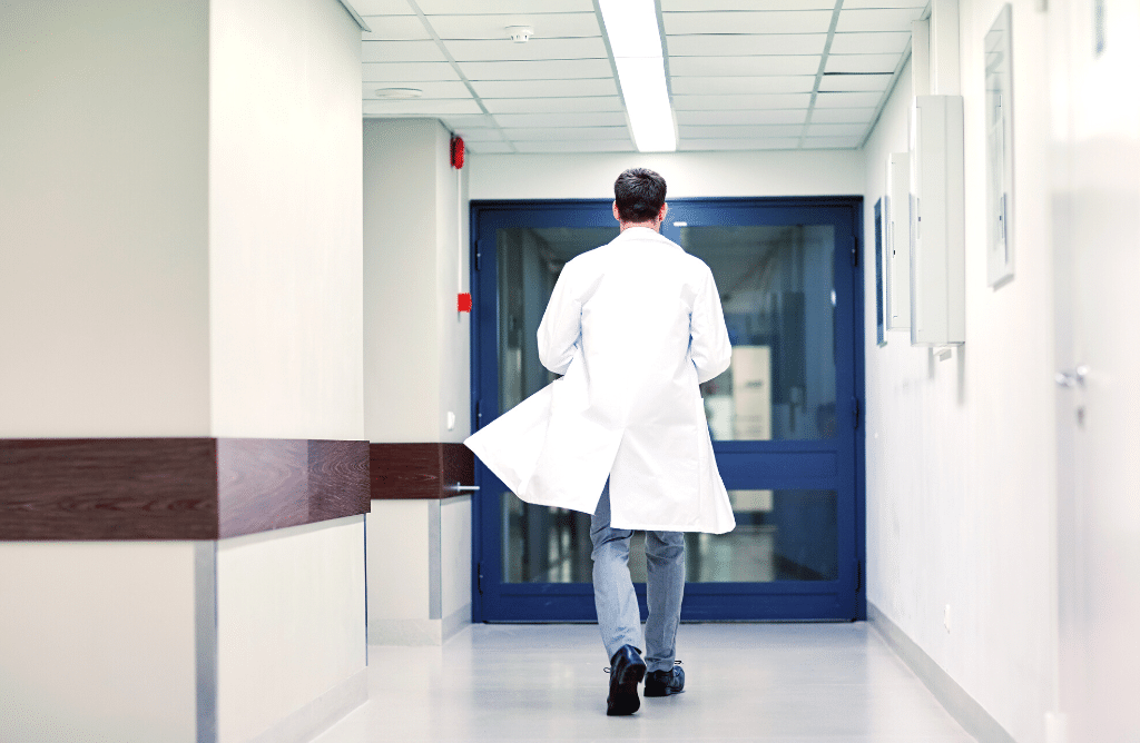 Photo of a doctor walking through a Sacramento Hospital