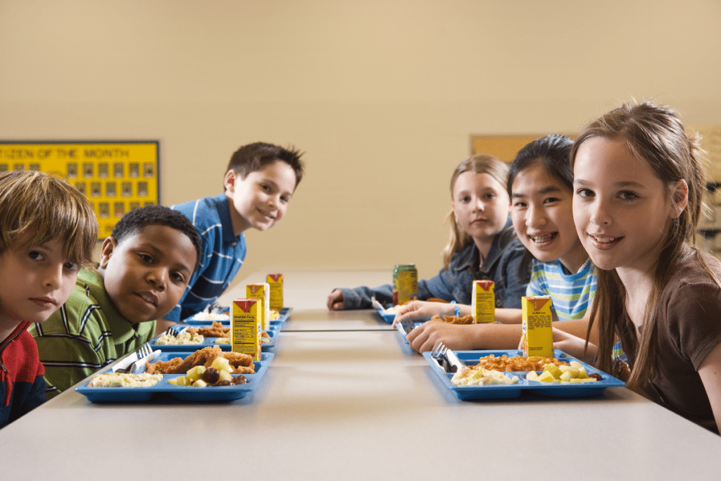 Children with their school lunch