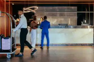 Hotel lobby with people checking in