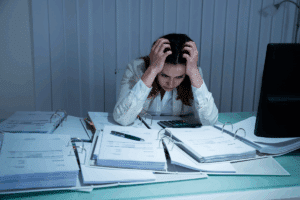 Overworked employee doing overtime