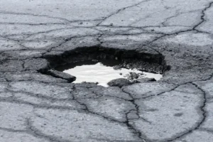 Pothole filled with water